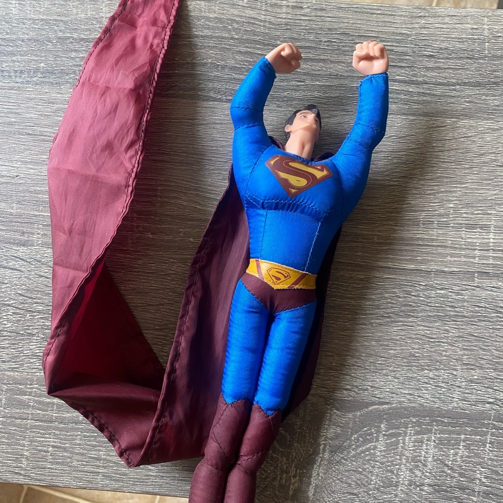 Superman swing shot action toy